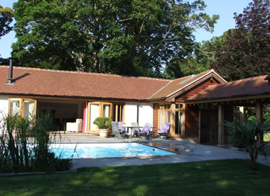 Holiday cottage with outdoor pool image 